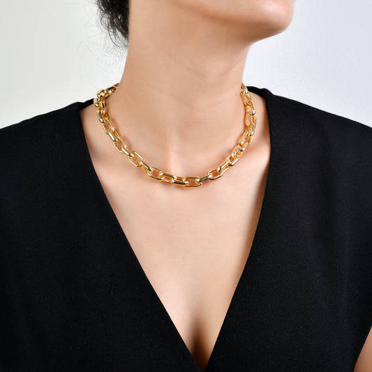 Model photo of chunky gold paper clip necklace